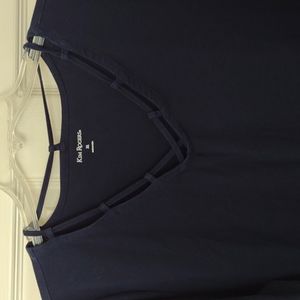 Navy blue top with decorative v neck design in size XL